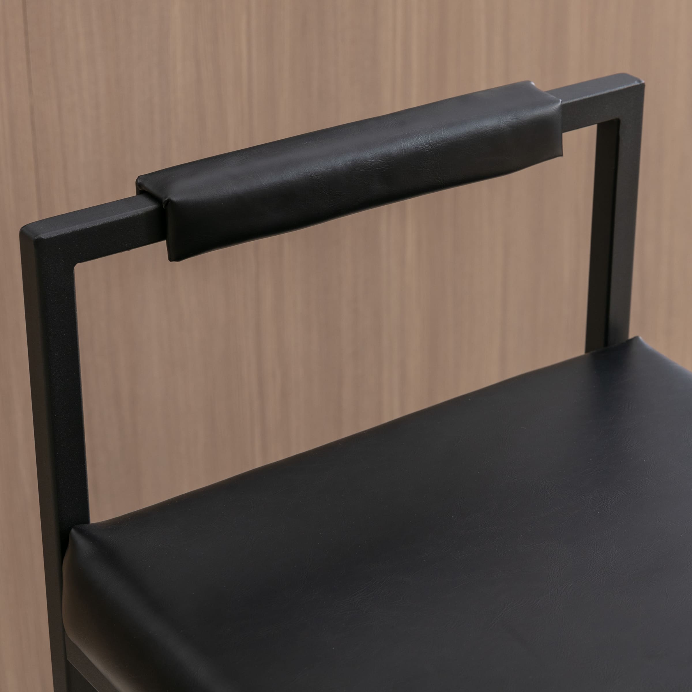 Close-up of backrest with padded grip
