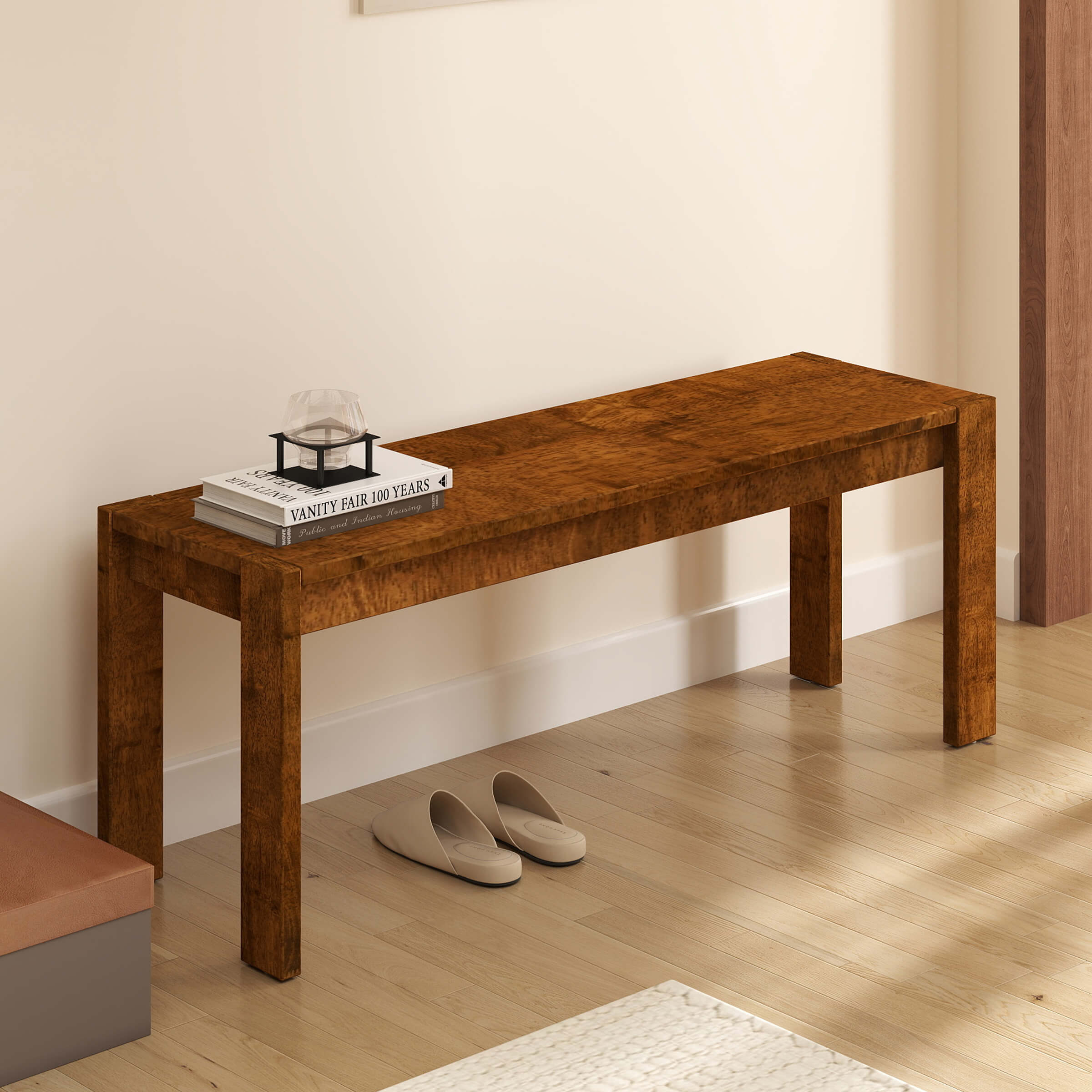 Wood bench in hallway with decor and shoes