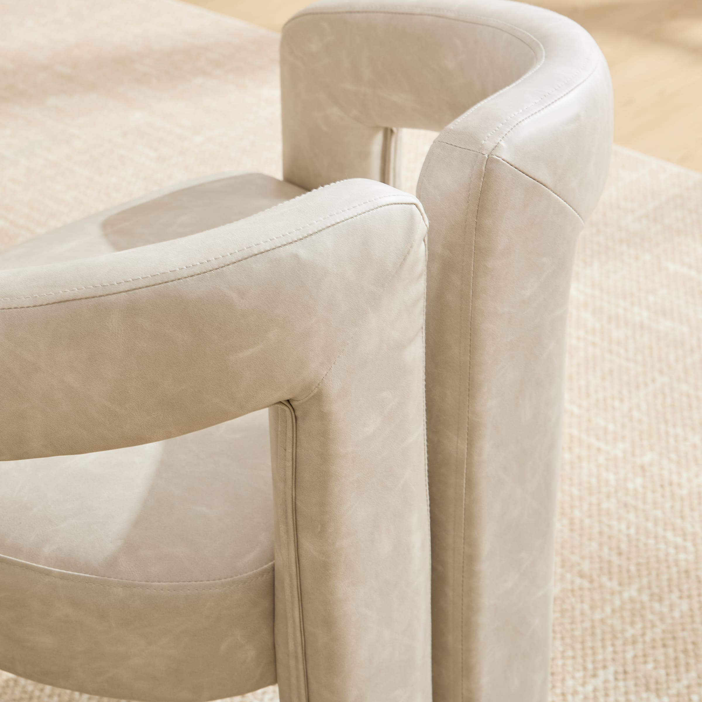 Corner of chair showing stitching