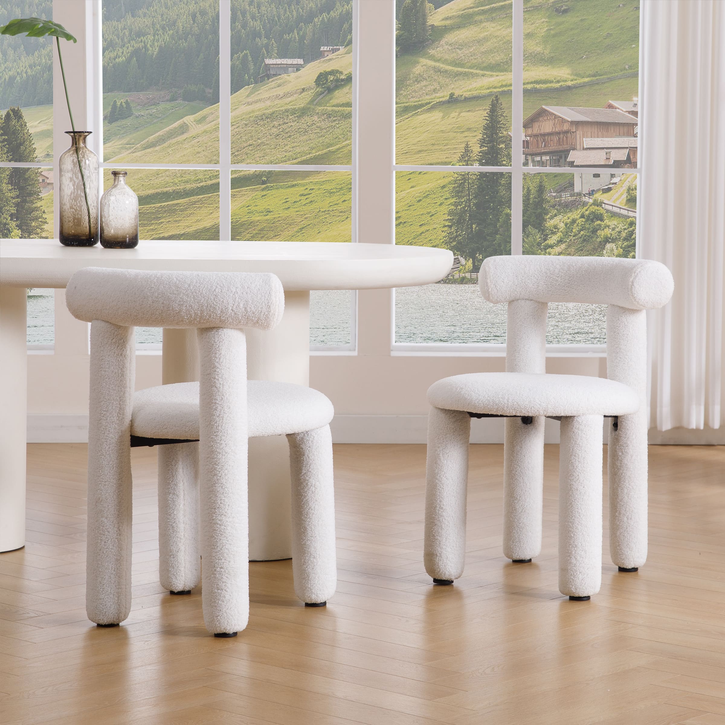 Front view of white sherpa dining chairs around table