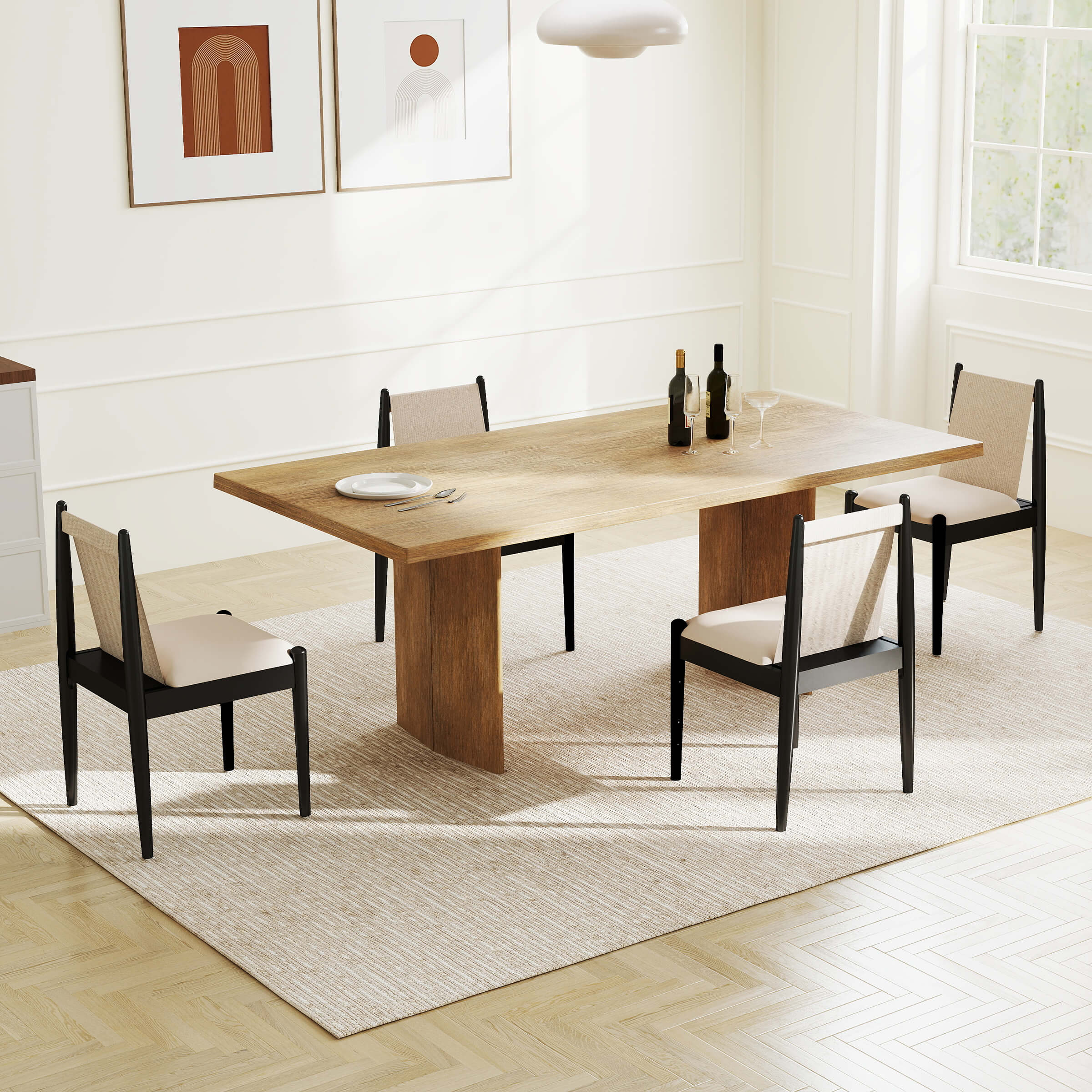 Dining table with chairs around it in a bright room