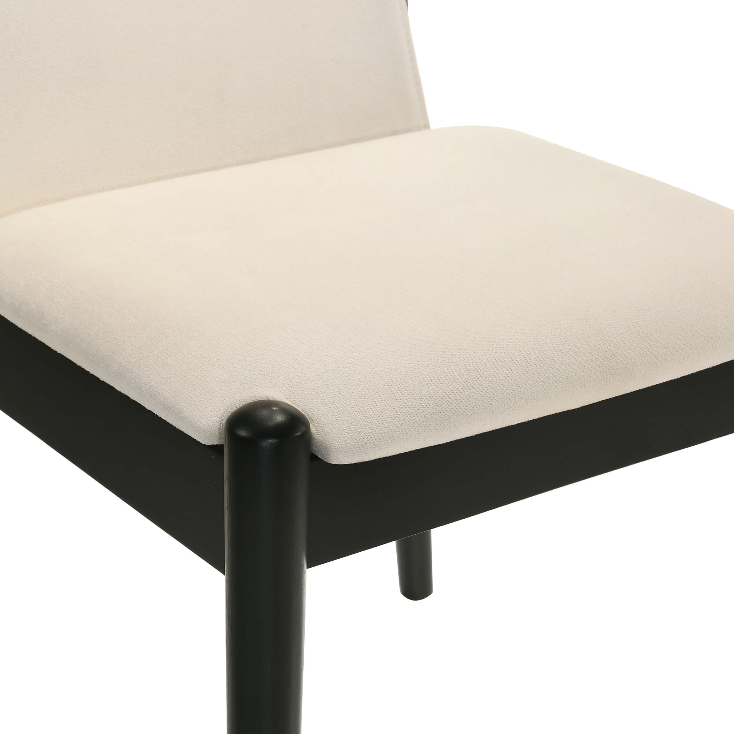 Close-up of chair seat and leg connection