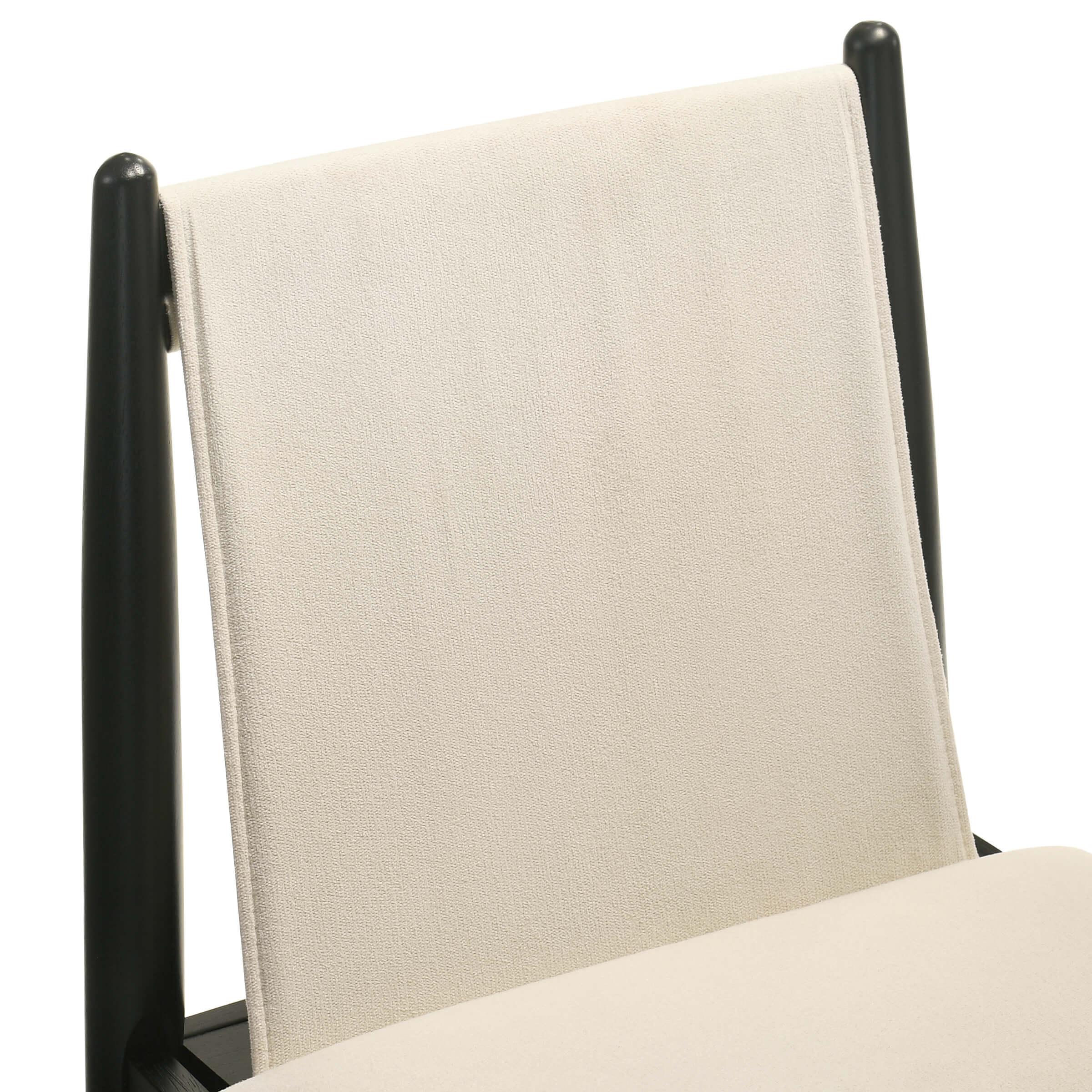 Close-up of chair back and upholstery in beige fabric