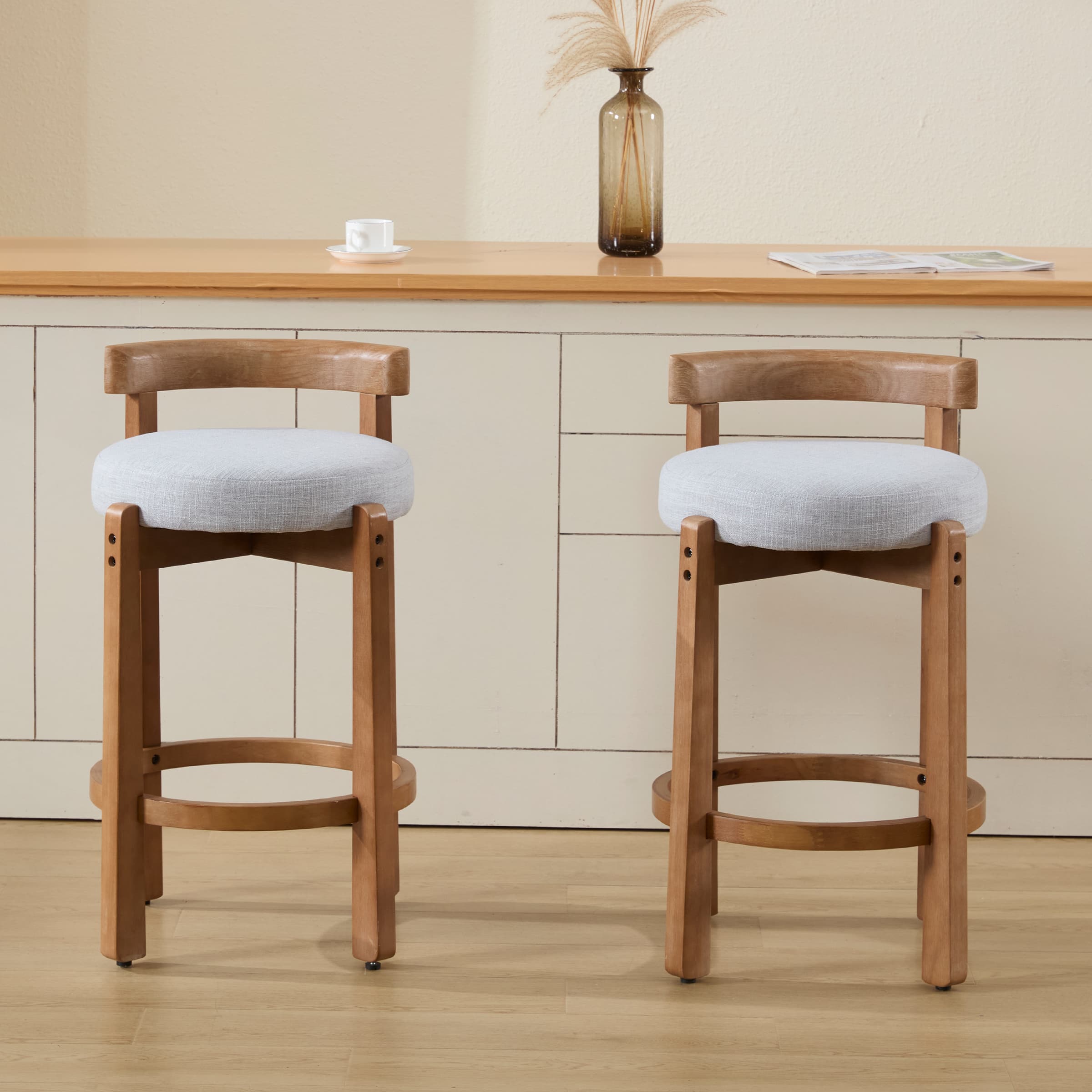 Three stools at a kitchen counter