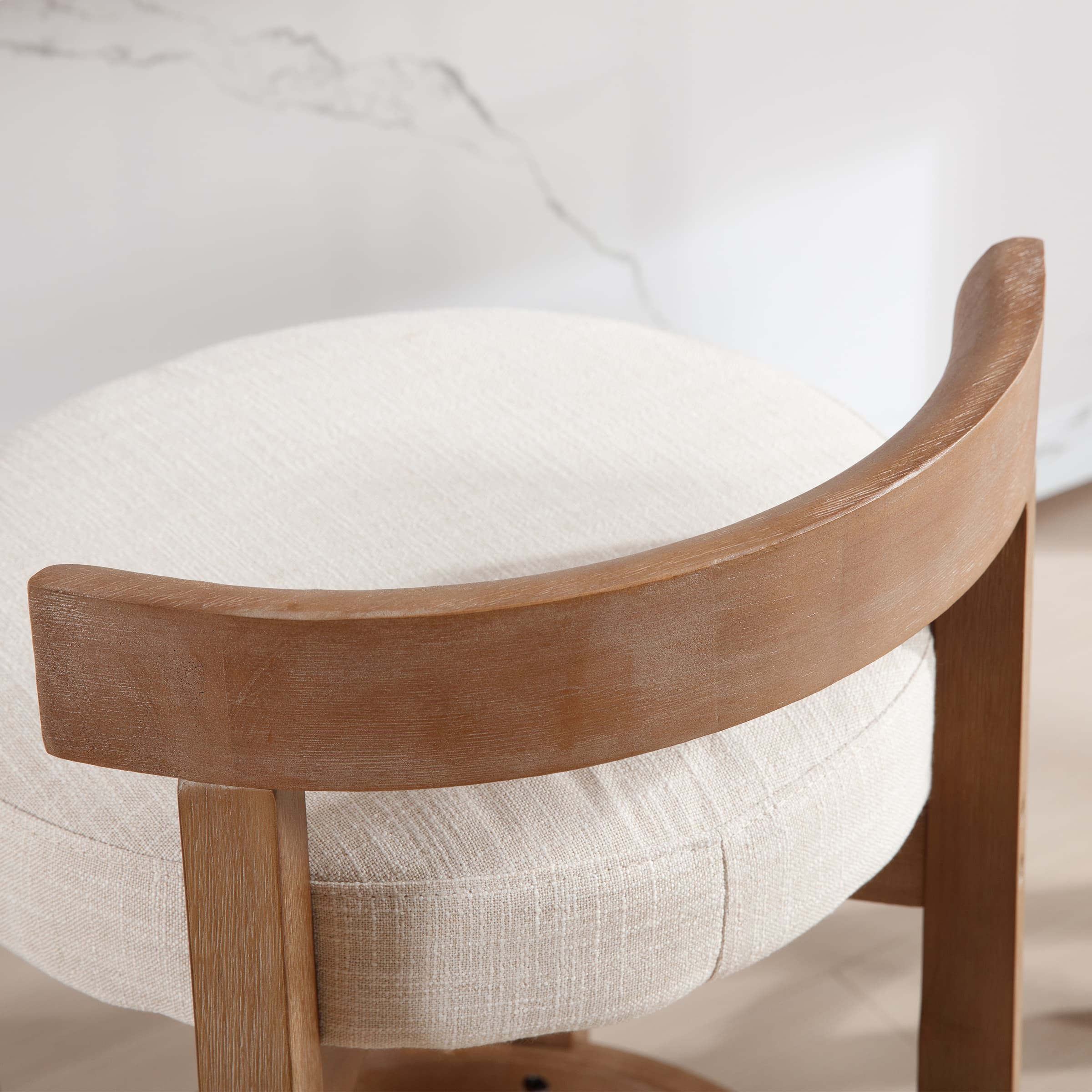 Close-up of stool leg and footrest connection