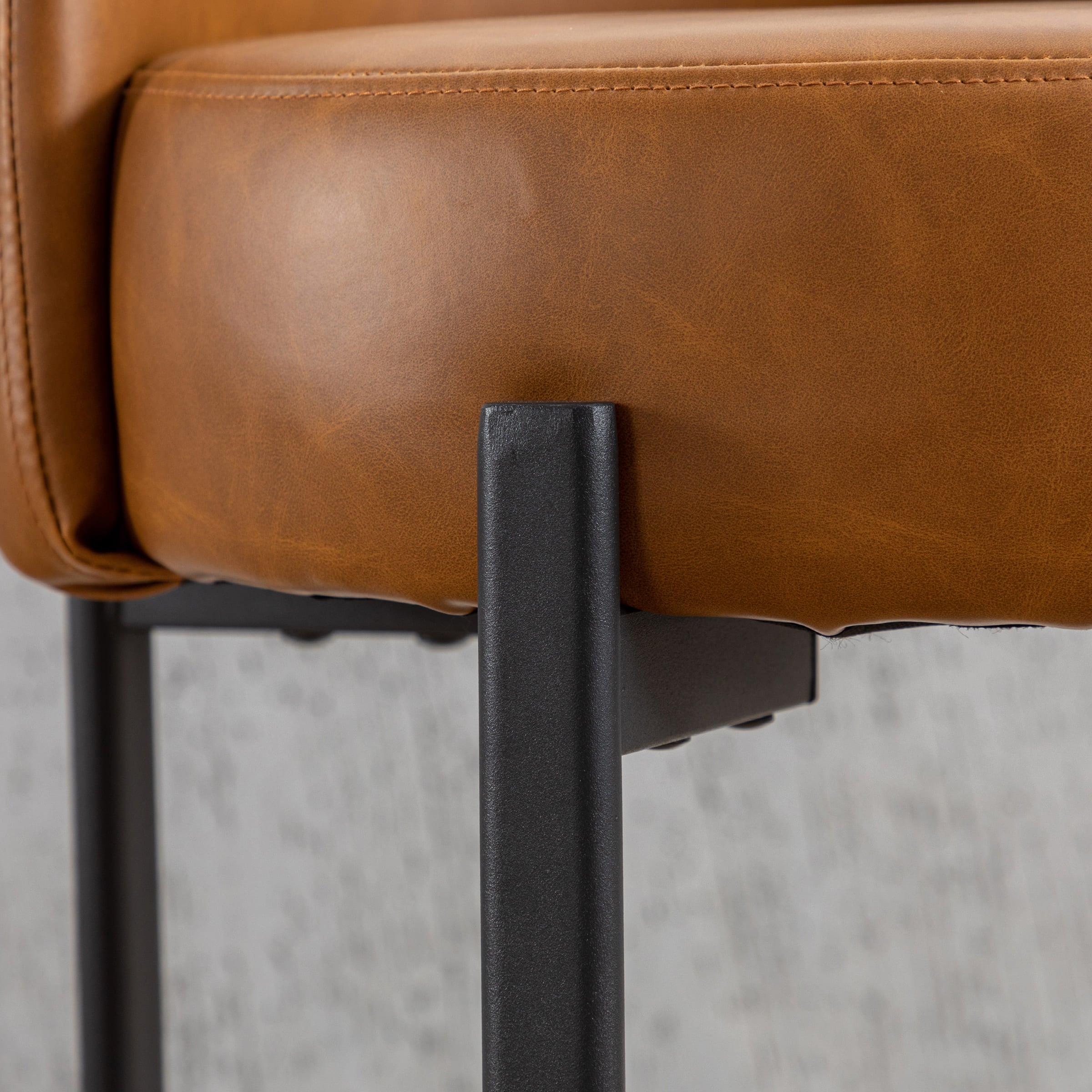 Leather upholstery close-up with seam