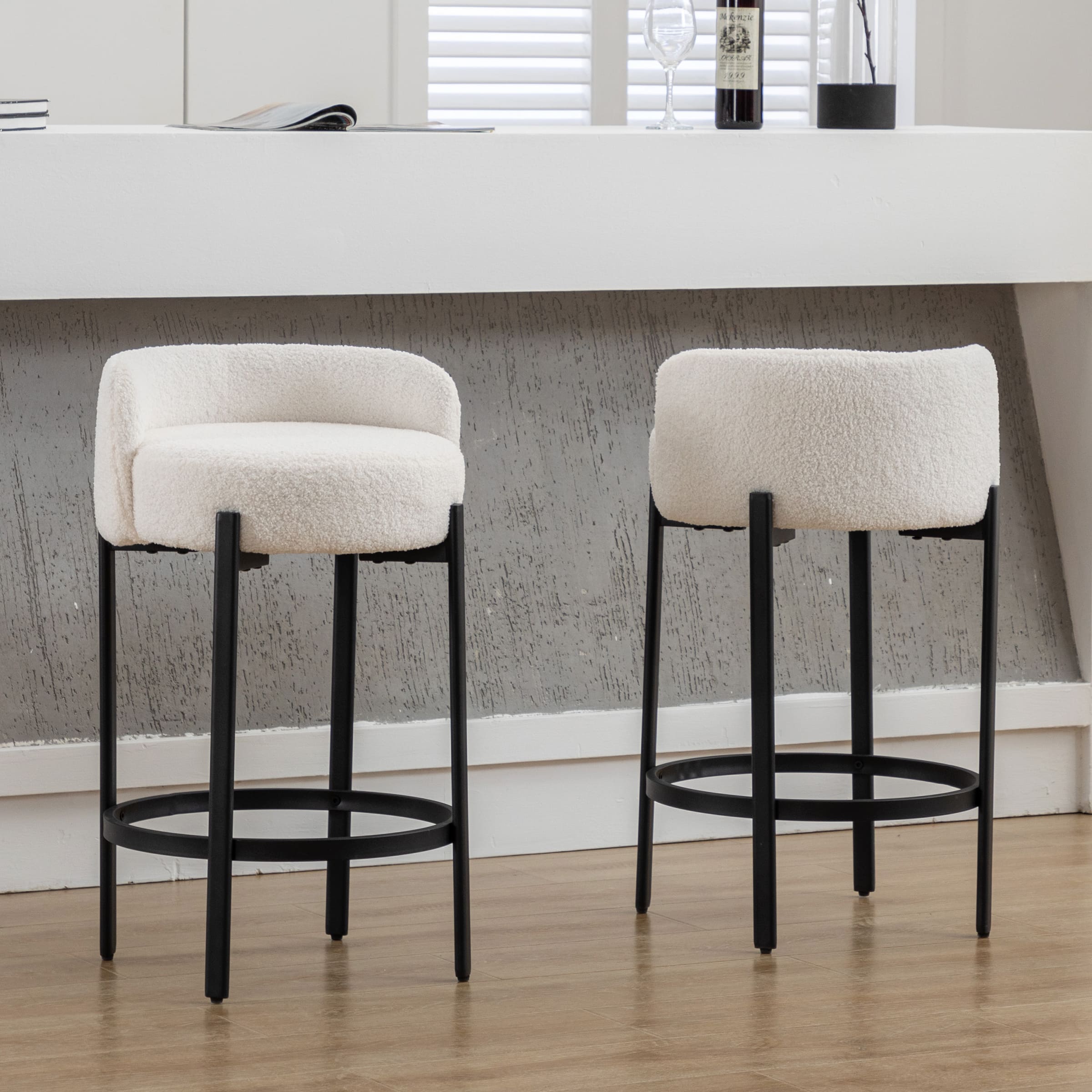 Two stools appear side-by-side
