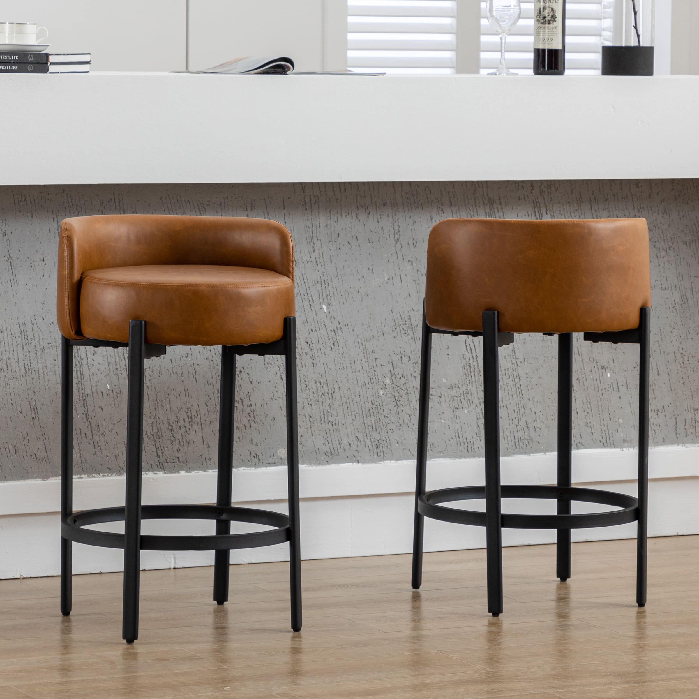 Two tan stools with varying angles