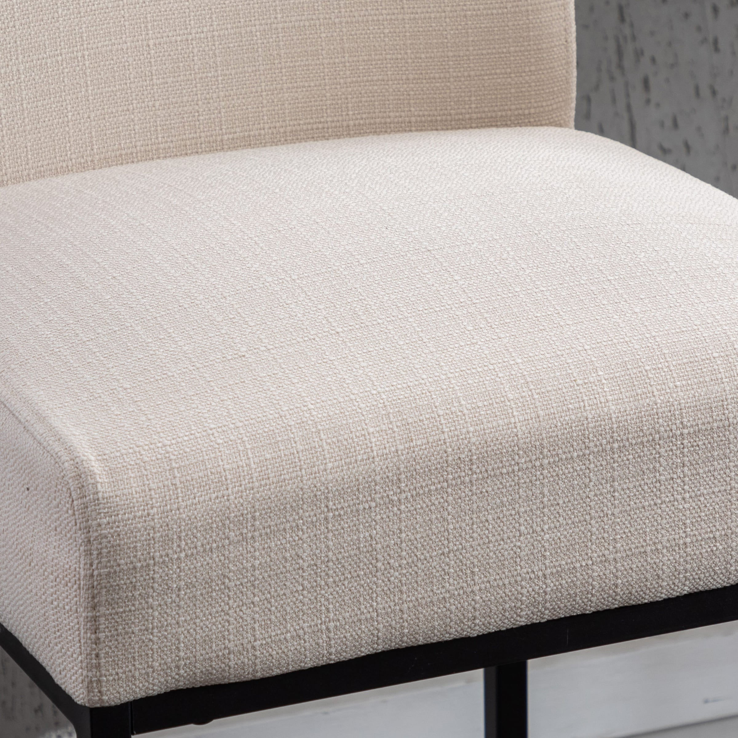 Close-up of beige fabric upholstery texture