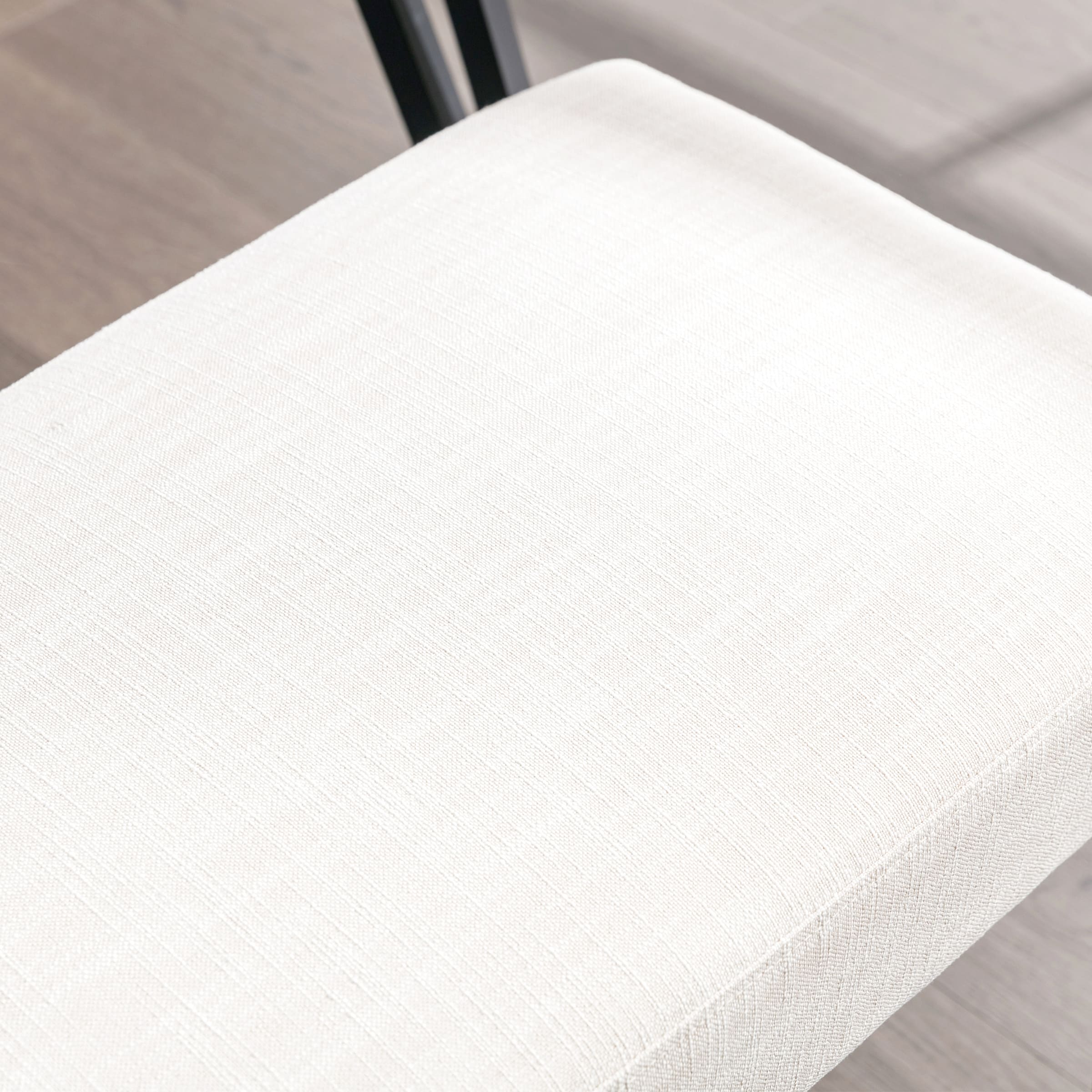 Close-up of beige upholstery fabric texture