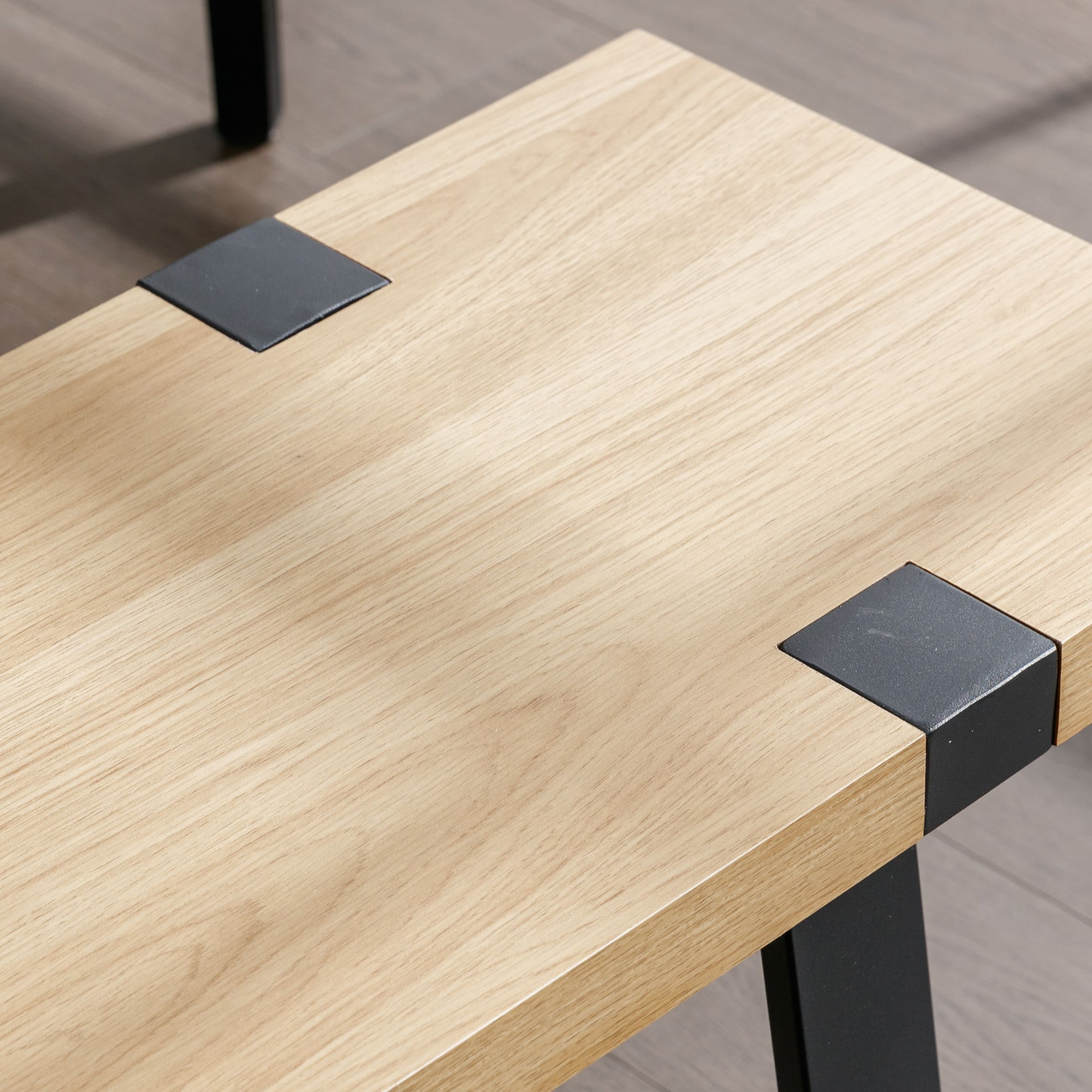 Wood grain close-up on bench top with connector plate