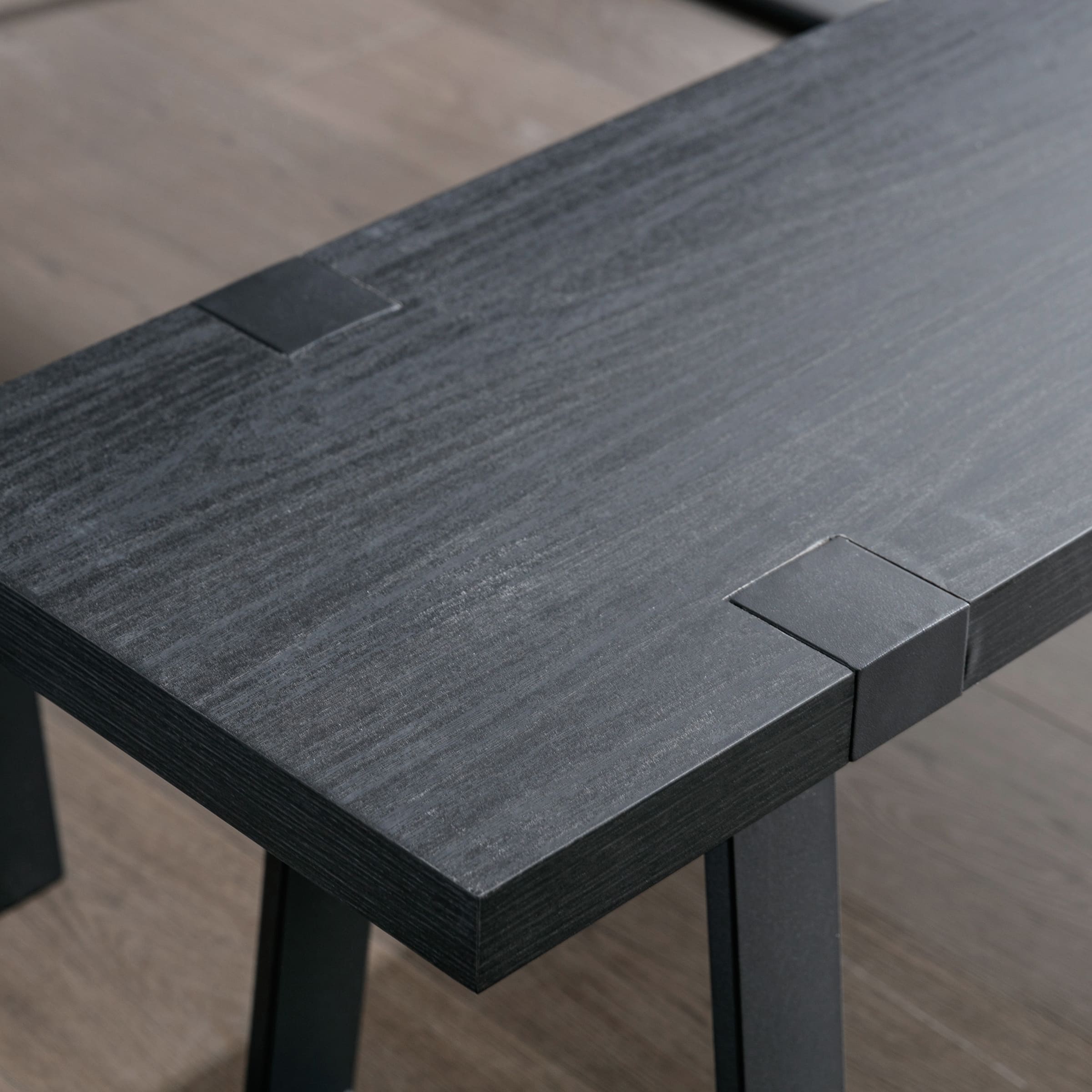 Close-up of bench corner showing wood grain and joints