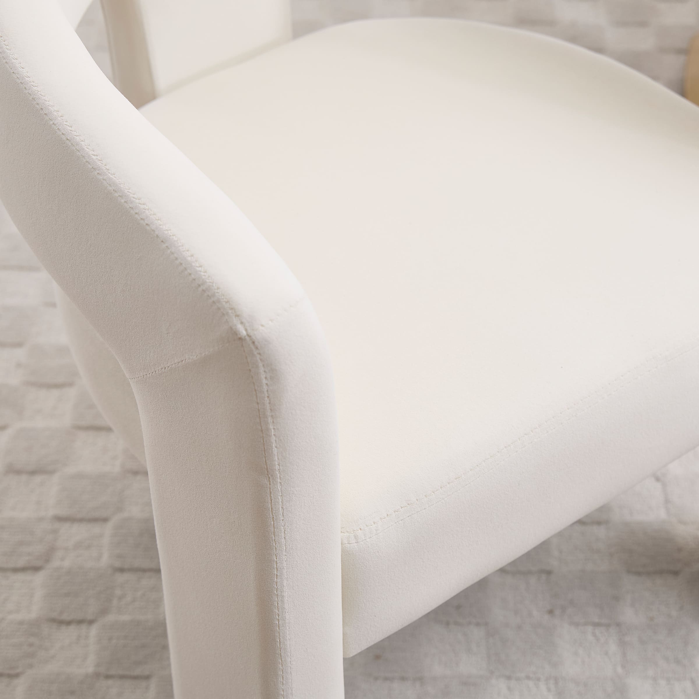 Close-up of chair arm and seam