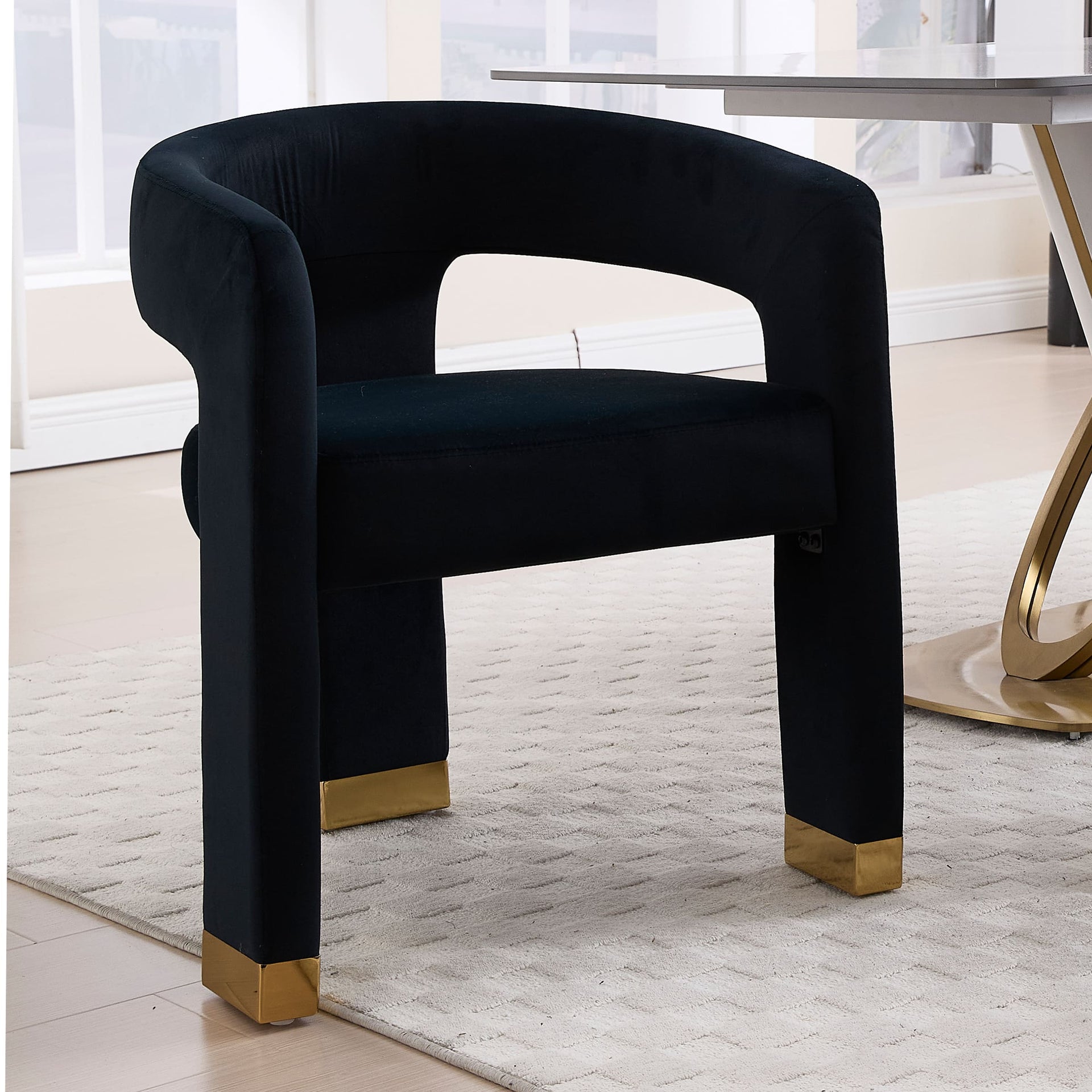 Open-back velvet barrel chair in navy