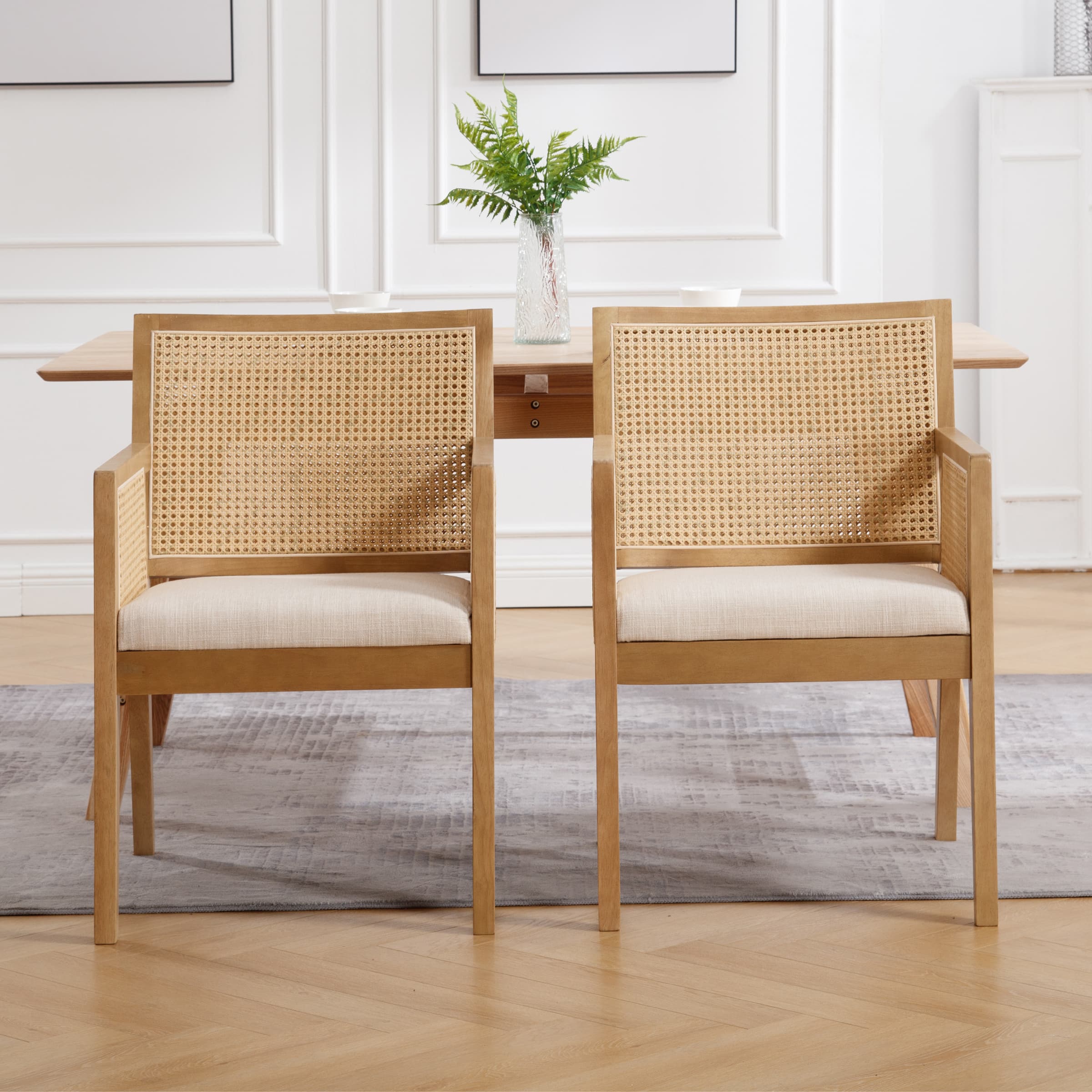 Two chairs at a table viewed from back