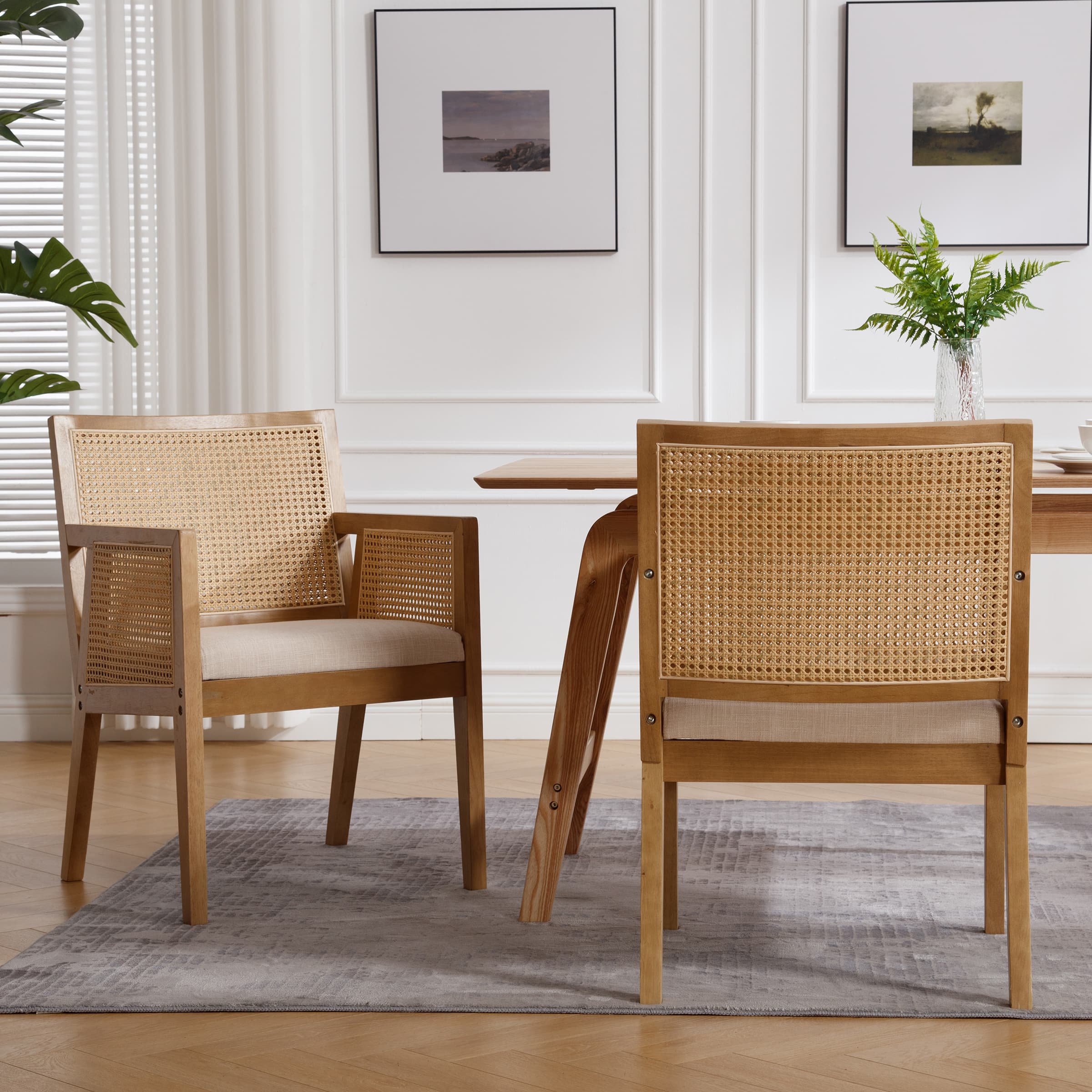 Chairs around a table with plants
