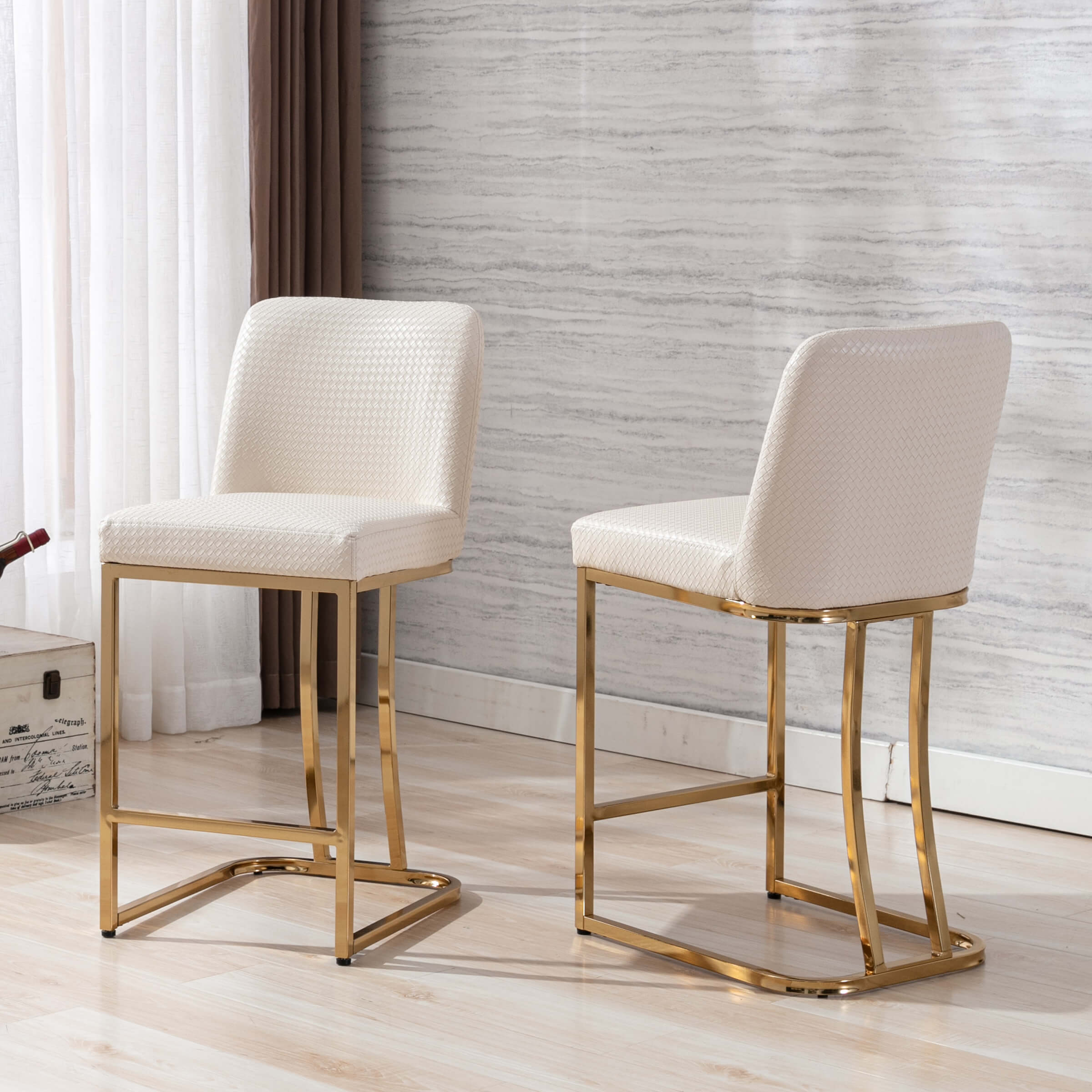 Two cream stools side by side