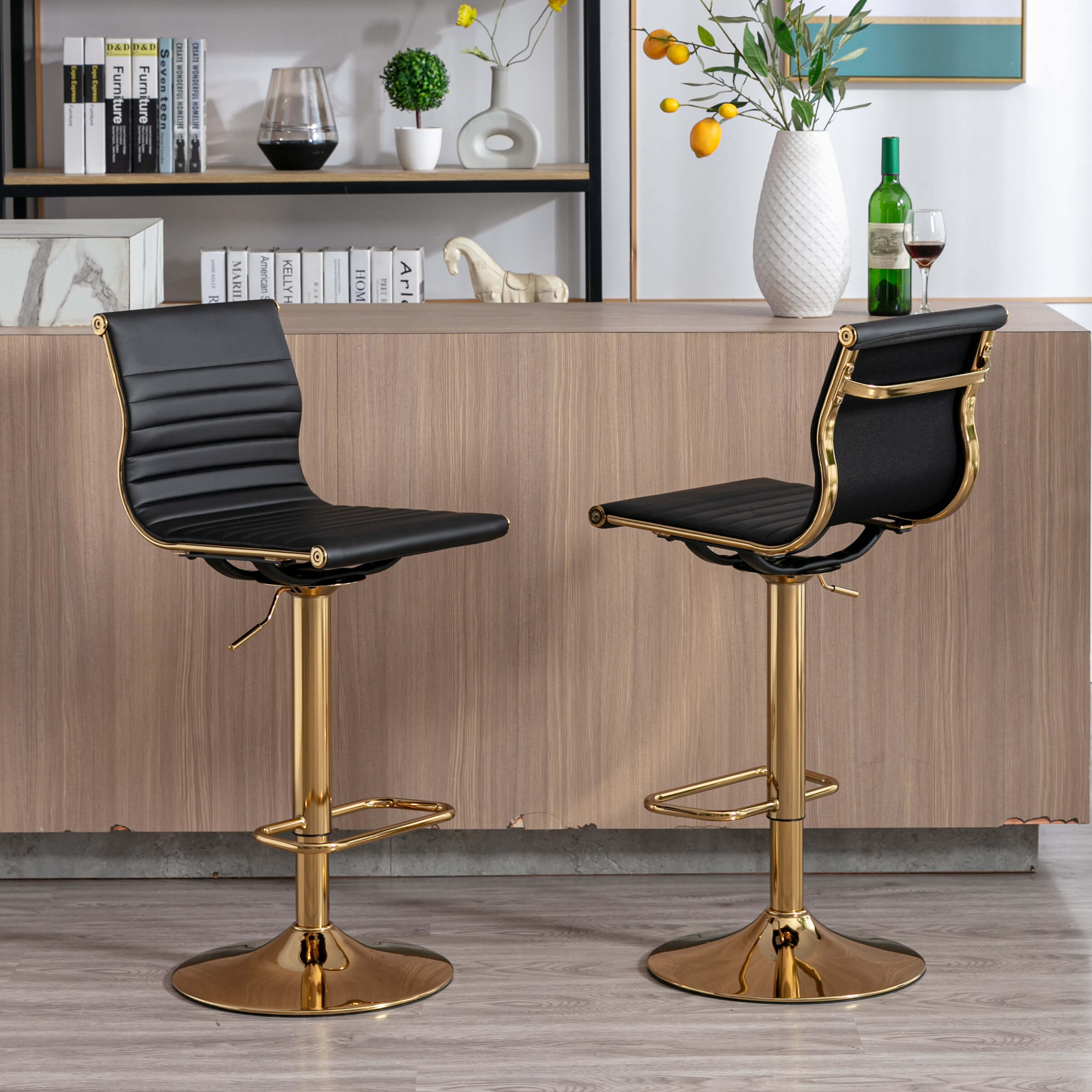Two-tone bar stools with black seats and gold frames