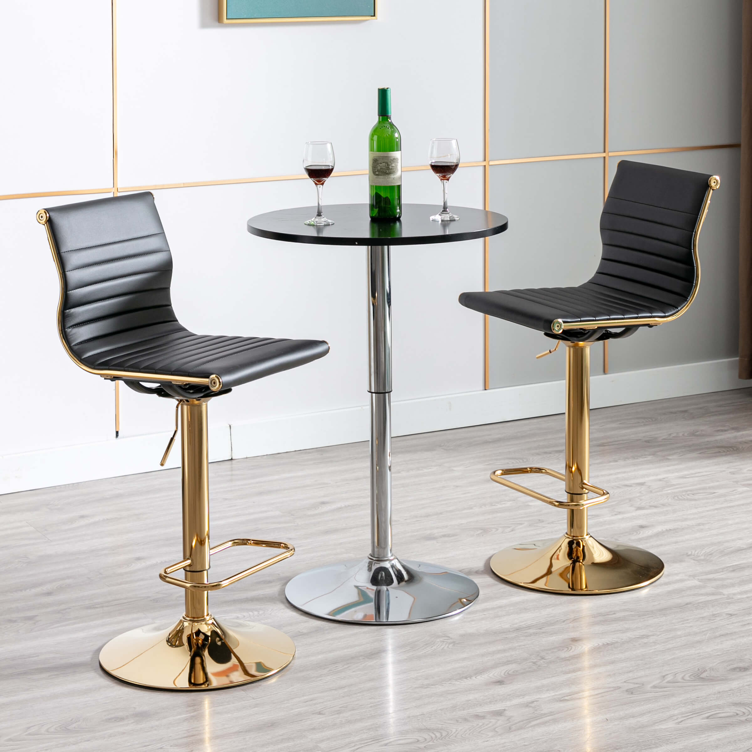 Grey/black bar stools at a high table