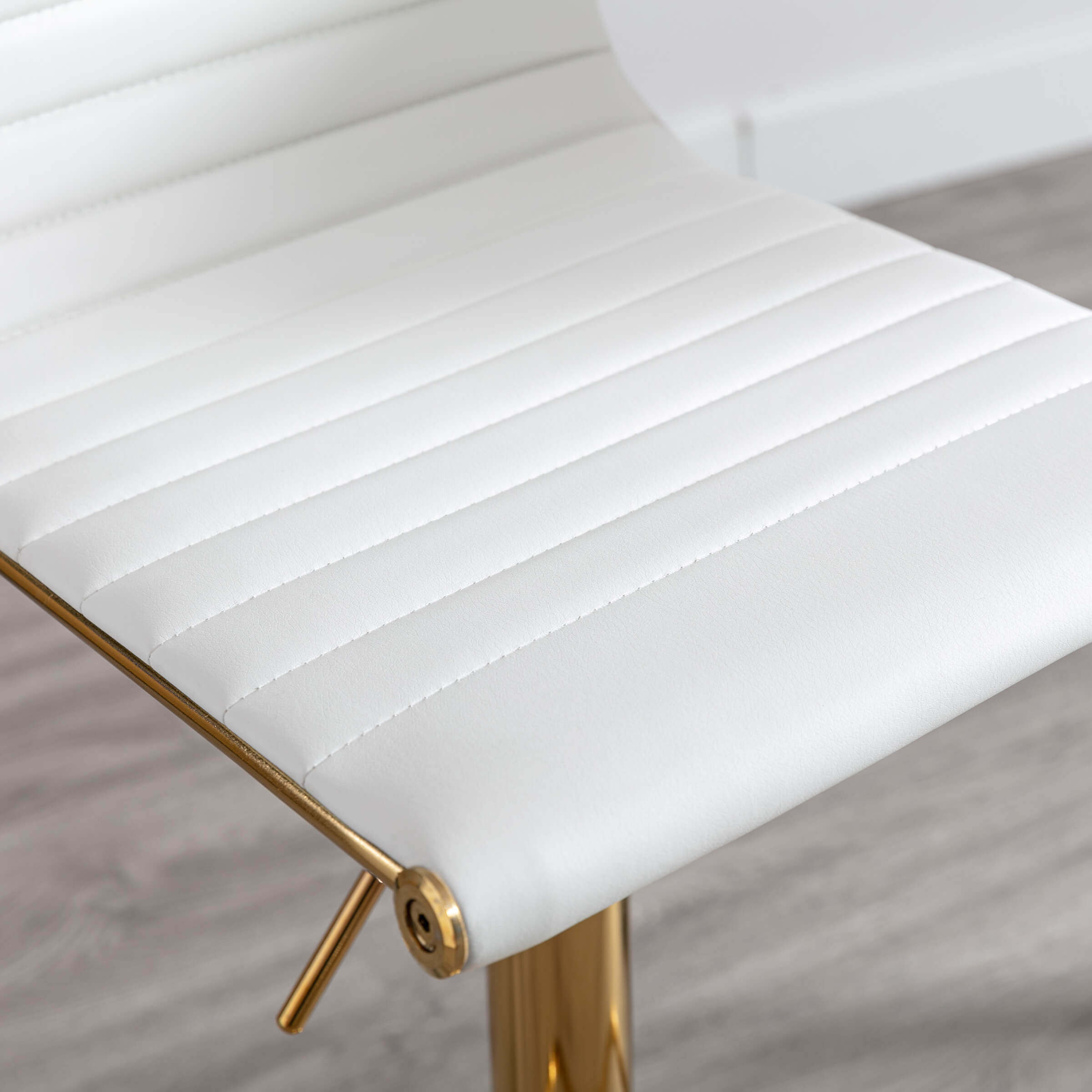 Close-up of white upholstery stitching