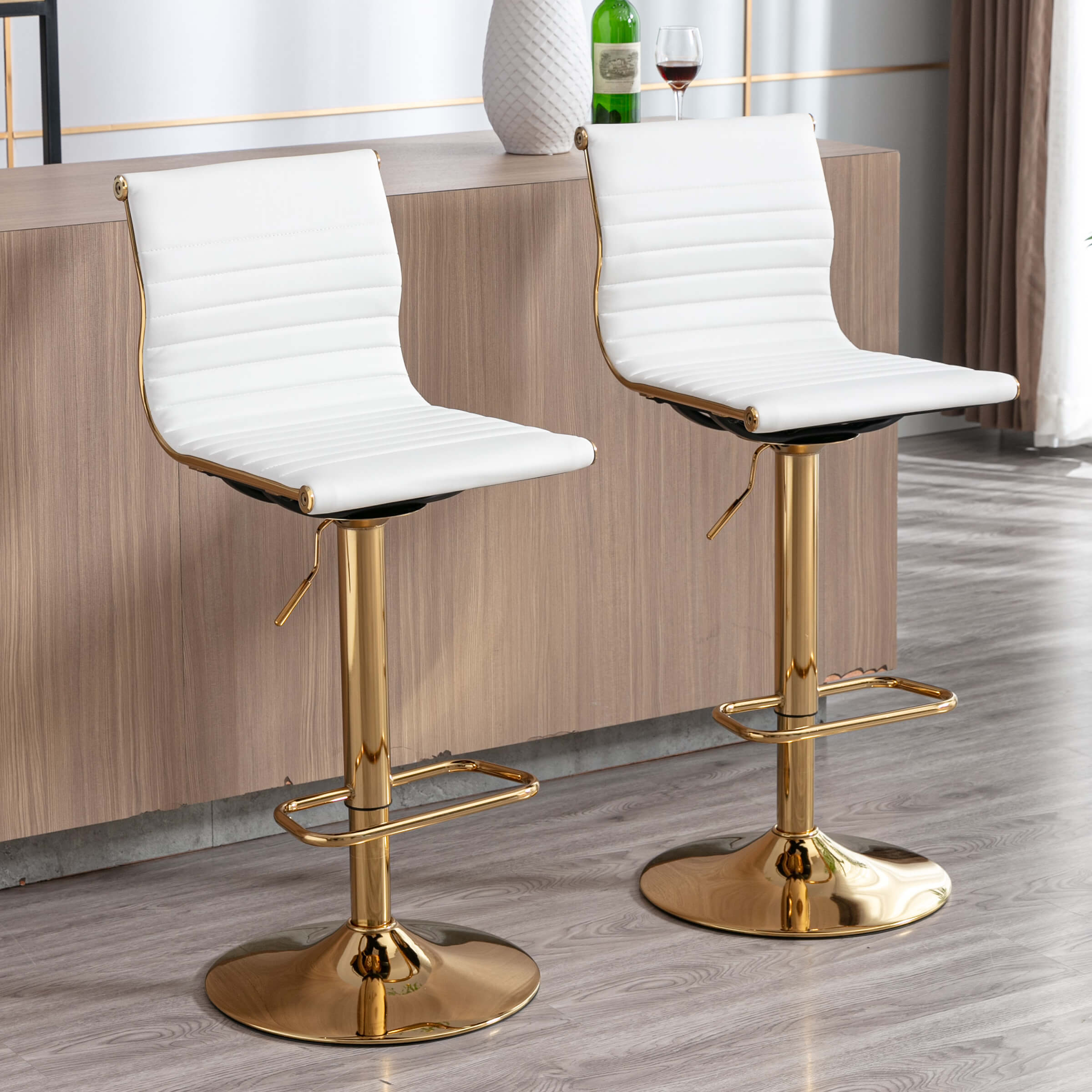 White and black stools at counter with drinks