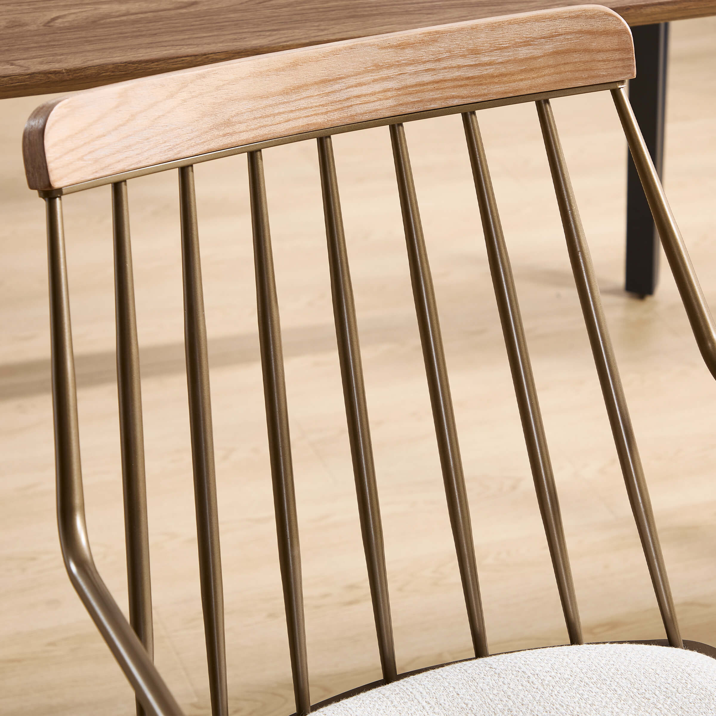 Close-up of chair back with vertical spindles and wooden top rail