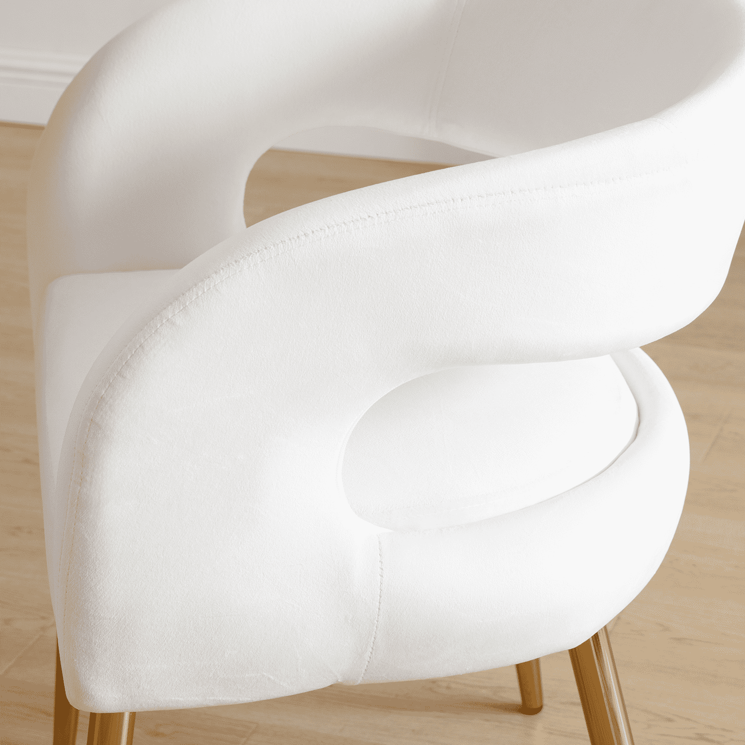 Close-up of armrest with hand pressing