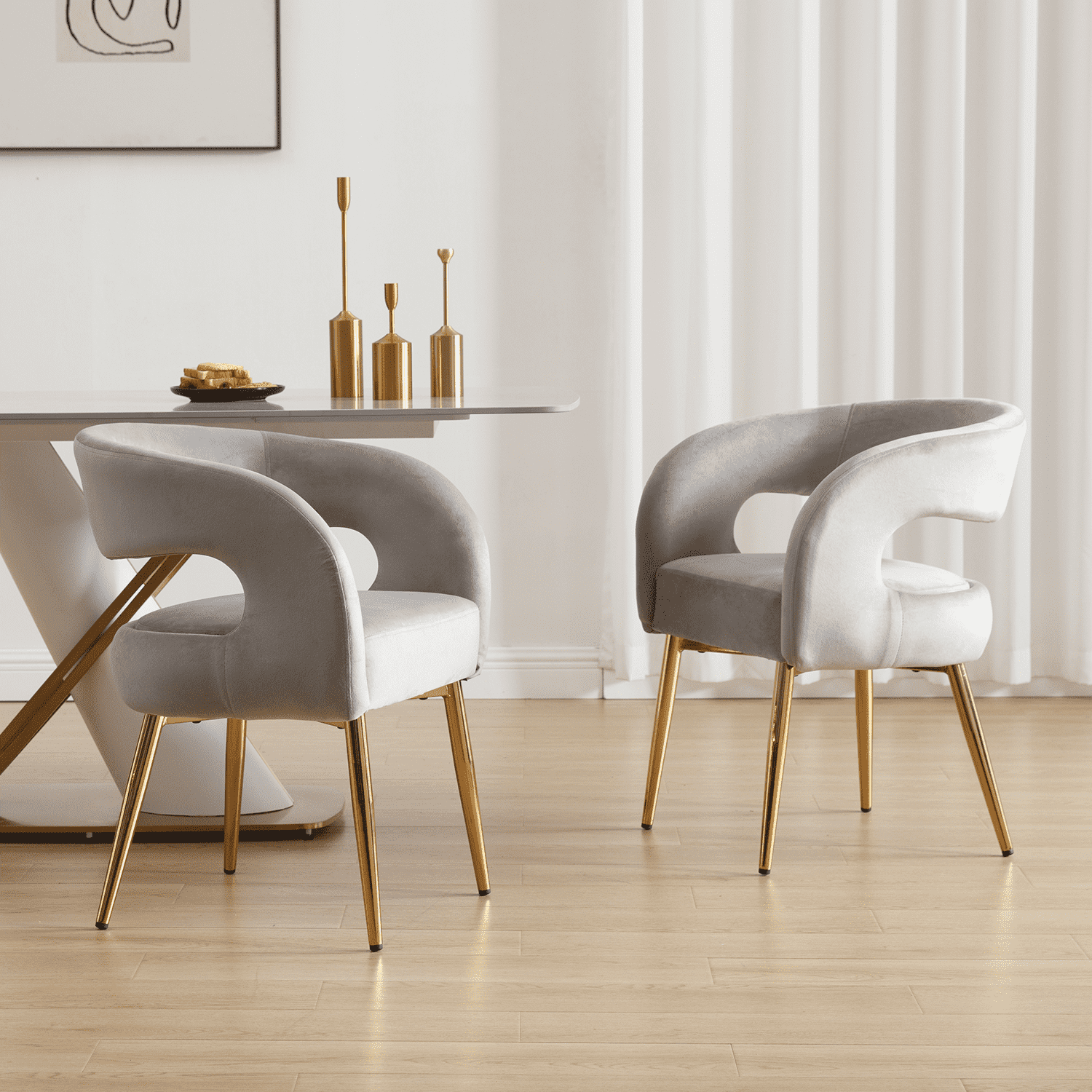 Four chairs around table in room