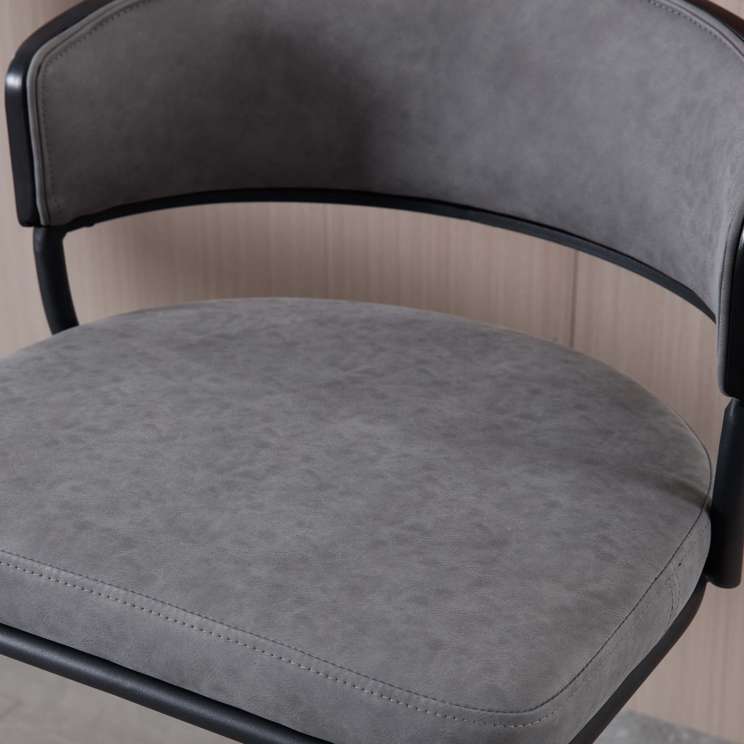 Grey cushioned seat close-up