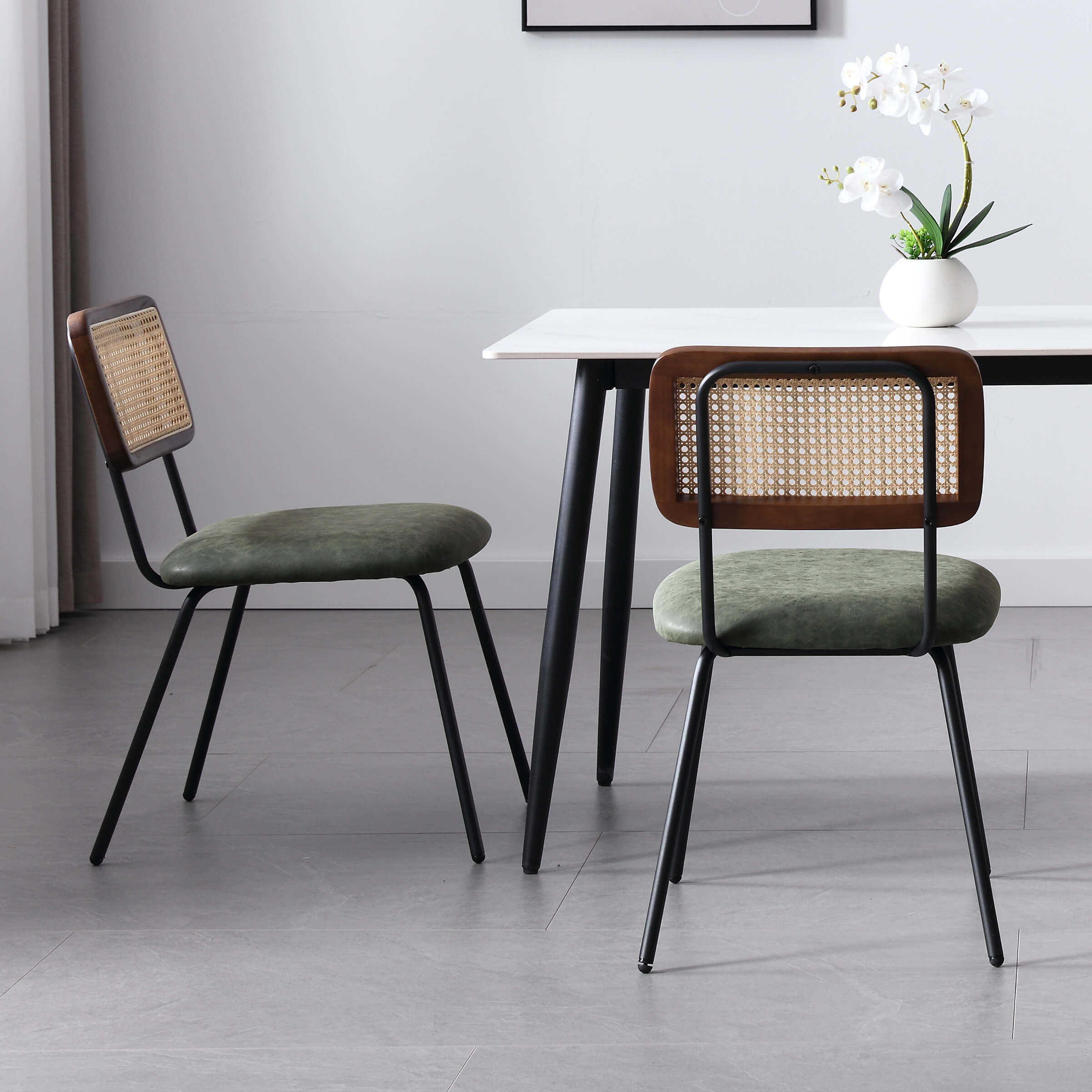 Chairs with different colored cushions around table