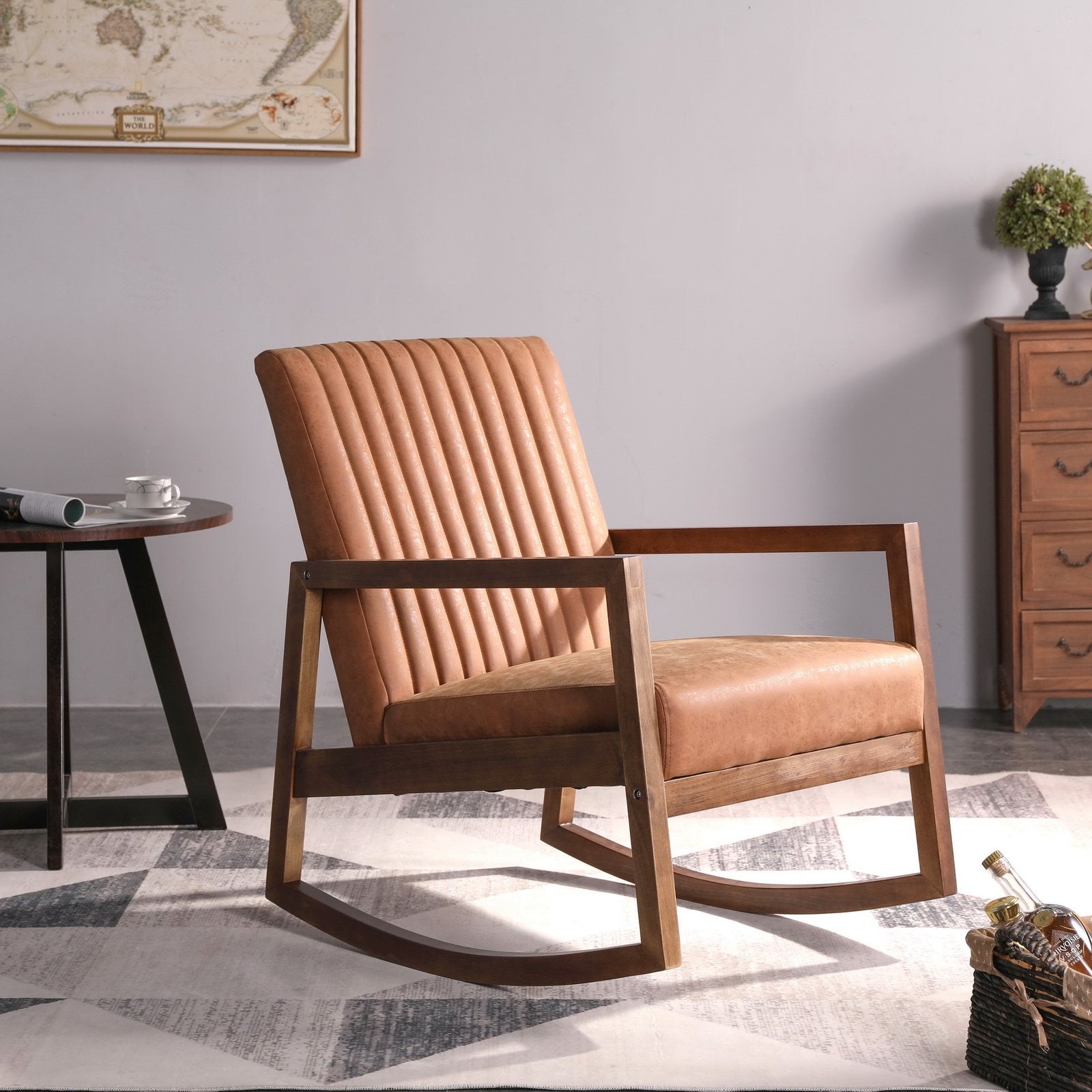 Brown leather mid-century rocking chair in a living room setup
